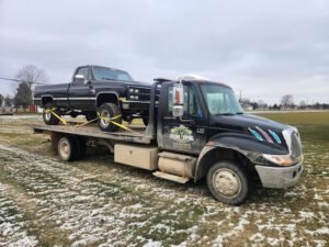 Frisbie Towing tow service company in Greenville, Michigan offering 24 hour towing near me
