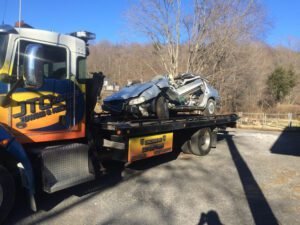 JTC Customs LLC tow service company in , offering 24 hour towing near me