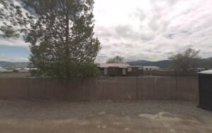 Axmen Recycling tow service company in Missoula, Montana offering 24 hour towing near me