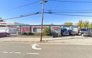 Hicksville Collision & Towing tow service company in Hicksville, New York offering 24 hour towing near me