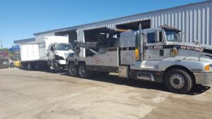 R.E. Ruehs Garage Inc. tow service company in Ionia, Michigan offering 24 hour towing near me
