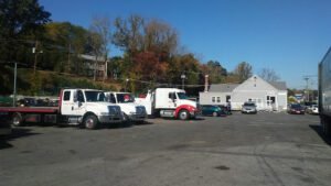 Red's Towing, Recovery, & Transport tow service company in West Springfield, Massachusetts offering 24 hour towing near me