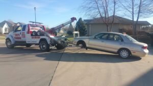 TEOS TOWING SERVICE & RECOVERY, TRUCK AND TRAILER REPAIR INC. tow service company in West Liberty, Iowa offering 24 hour towing near me