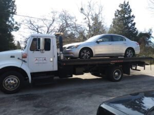 IN A FLASH TOWING LLC tow service company in , offering 24 hour towing near me