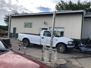 Dave's tow service company in Dumont, Iowa offering 24 hour towing near me