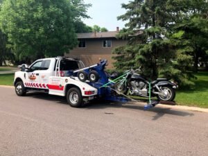 Feist Towing tow service company in Brooklyn Park, Minnesota offering 24 hour towing near me