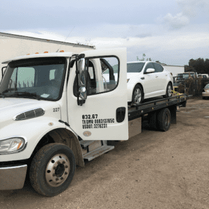 Peacock transport (towing) tow service company in Houston, Texas offering 24 hour towing near me