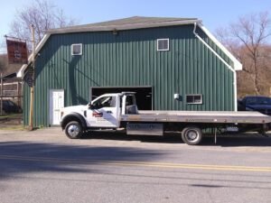 Lowe's Garage towing and recovery tow service company in Emeigh, Pennsylvania offering 24 hour towing near me