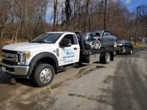 Elite Junk Cars - Cash for Cars tow service company in , offering 24 hour towing near me