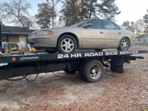 Freedom hauling towing & dumpster rental tow service company in , offering 24 hour towing near me