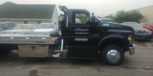 Ultimate Automotive Service Center tow service company in Urbandale, Iowa offering 24 hour towing near me