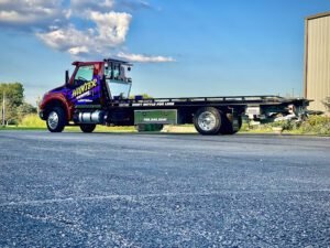 HEDINGER'S EQUIPMENT tow service company in Indianapolis, Indiana offering 24 hour towing near me