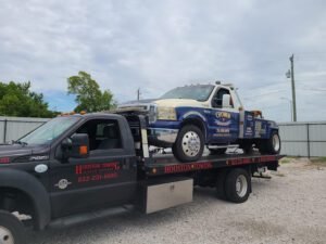 Aubert's Towing tow service company in Indianola, Iowa offering 24 hour towing near me