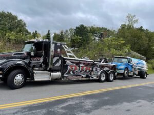 Tommie's Tires & Towing (Acehole Hauling & Helping Hands LLC) tow service company in Boonville, Missouri offering 24 hour towing near me