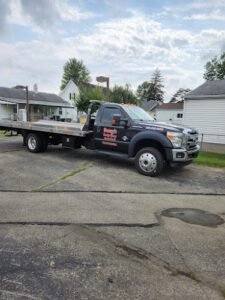 dougs body shop and towing tow service company in Connersville, Indiana offering 24 hour towing near me