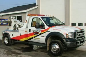 Village Towing & Auto Repair tow service company in Kawkawlin, Michigan offering 24 hour towing near me