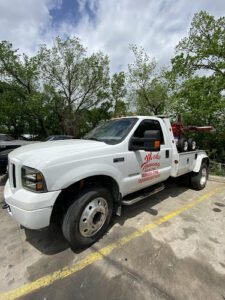 MEKE Towing tow service company in Dallas, Texas offering 24 hour towing near me