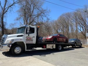 FJR Towing Transport Inc. tow service company in Springfield, Massachusetts offering 24 hour towing near me