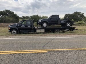 Mike's Garage & Wrecker Services tow service company in Devine, Texas offering 24 hour towing near me