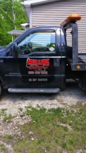 Mullins Towing LLC tow service company in Owingsville, Kentucky offering 24 hour towing near me