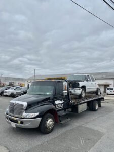 TLI Auto Inc tow service company in West Babylon, New York offering 24 hour towing near me