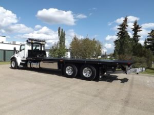 QEJ Towing Of Boston MA tow service company in , offering 24 hour towing near me