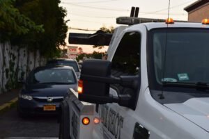 TOWING QUEENS tow service company in , offering 24 hour towing near me