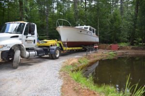 Hladik's Specialized Transport tow service company in Scotia, New York offering 24 hour towing near me