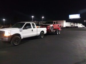 Tow For The Low tow service company in , offering 24 hour towing near me