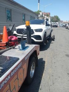 Louie Towing BK tow service company in Brooklyn, New York offering 24 hour towing near me