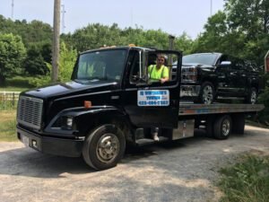 EJ Whitakers Towing tow service company in , offering 24 hour towing near me