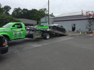 Slims Towing & Recovery tow service company in , offering 24 hour towing near me