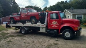 Kevin's body shop & towing tow service company in Elsie, Michigan offering 24 hour towing near me