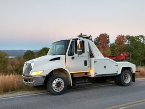 HUCKINS TOWING & RECOVERY tow service company in Center Ossipee, New Hampshire offering 24 hour towing near me