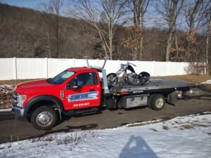 Cotes Towing llc tow service company in Waterbury, Connecticut offering 24 hour towing near me