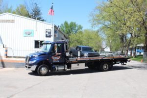 Jostes Garage tow service company in Rochester, Illinois offering 24 hour towing near me