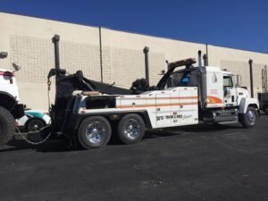 RED'S TOWING tow service company in Denver, Colorado offering 24 hour towing near me