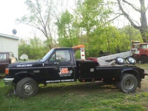 Top Dog Towing and Recovery LLC tow service company in West Lafayette, Ohio offering 24 hour towing near me