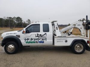 Hudson Towing & Tire tow service company in Washington, North Carolina offering 24 hour towing near me
