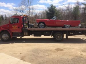 Emery's Towing & Recovery LLC tow service company in Brownfield, Maine offering 24 hour towing near me