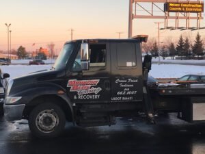 Midnight Blue Towing tow service company in Crown Point, Indiana offering 24 hour towing near me