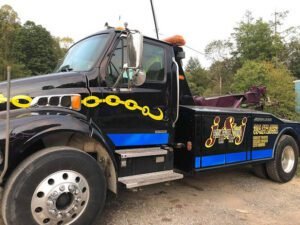 J & J Body/Frame & Towing, Inc. tow service company in Canvas, West Virginia offering 24 hour towing near me
