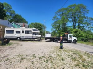 DJ'S Towing & Auto Service and Uhaul Dealer tow service company in Muncie, Indiana offering 24 hour towing near me