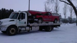 Britt Auto Service tow service company in Garner, Iowa offering 24 hour towing near me