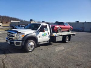 MX2 Enterprises LLC tow service company in Smithton, Pennsylvania offering 24 hour towing near me